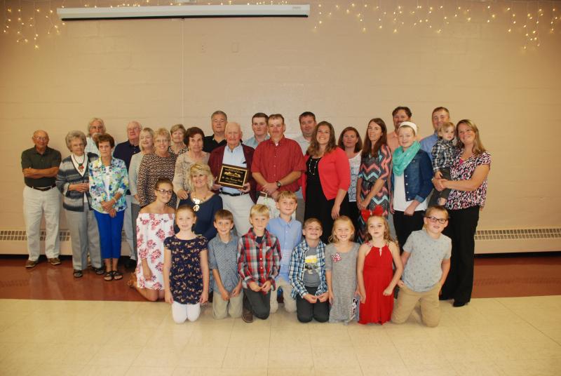 Alvin Conaway (holding award) is patriarch of the Conaway family of Georgetown, named Sussex County Farm Bureau's Farm Family of the Year. Thirty-two family members gathered for a group portrait at the bureau’s annual banquet Oct. 7. SUBMITTED PHOTOS